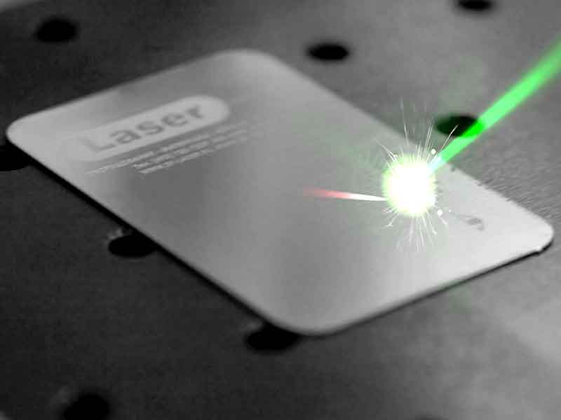 Laser marking of a metal workpiece